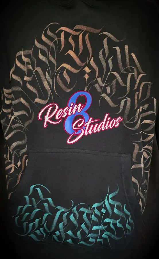 Custom printed hoodie produced in the Resin 8 Studios apparel workshop