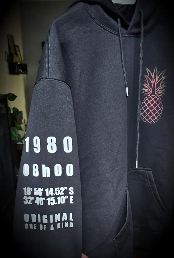 Custom printed hoodie produced in the Resin 8 Studios apparel workshop