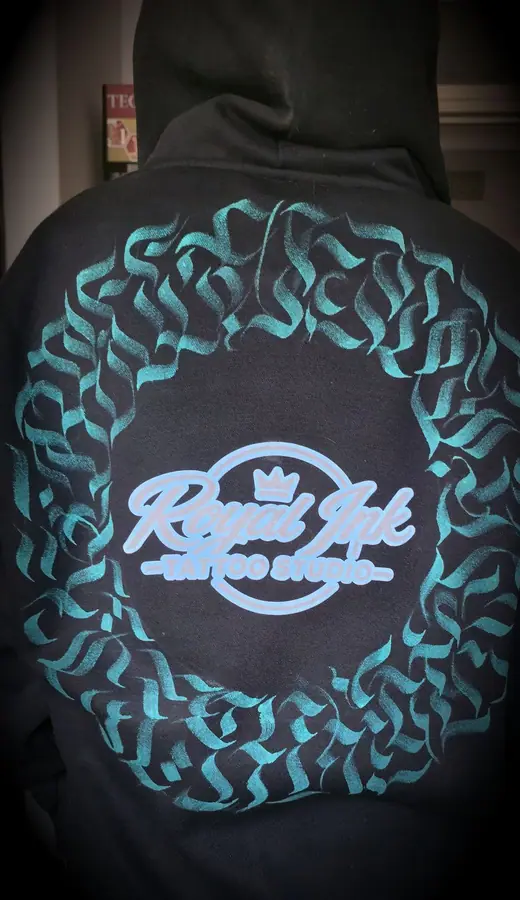 Custom printed hoodie produced in the Resin 8 Studios apparel workshop