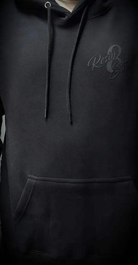 Custom printed hoodie produced in the Resin 8 Studios apparel workshop