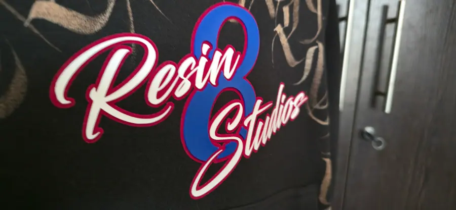 Close-up of print and embroidery detail on a garment by Resin 8 Studios